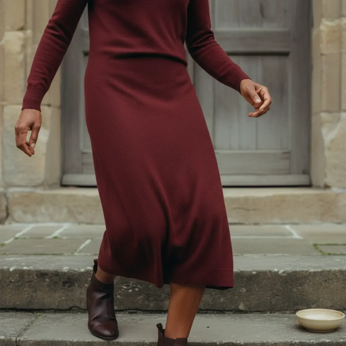 The fine-knit dress and ankle boots