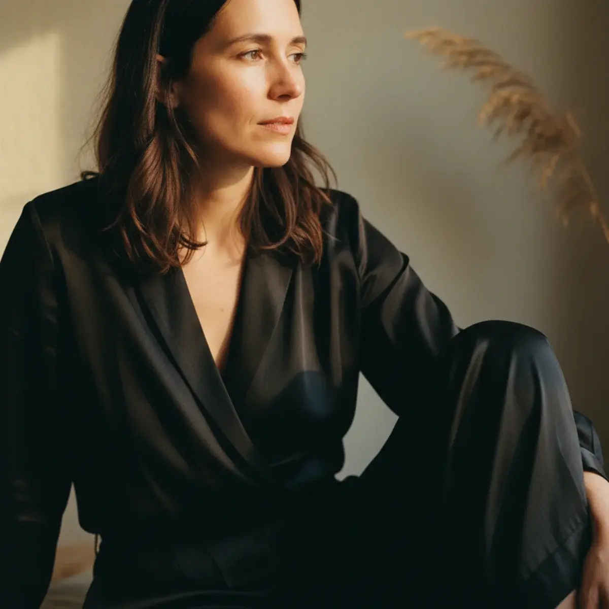 Cocktail accessories: metallic heels, a small clutch, statement earrings, and a delicate necklace