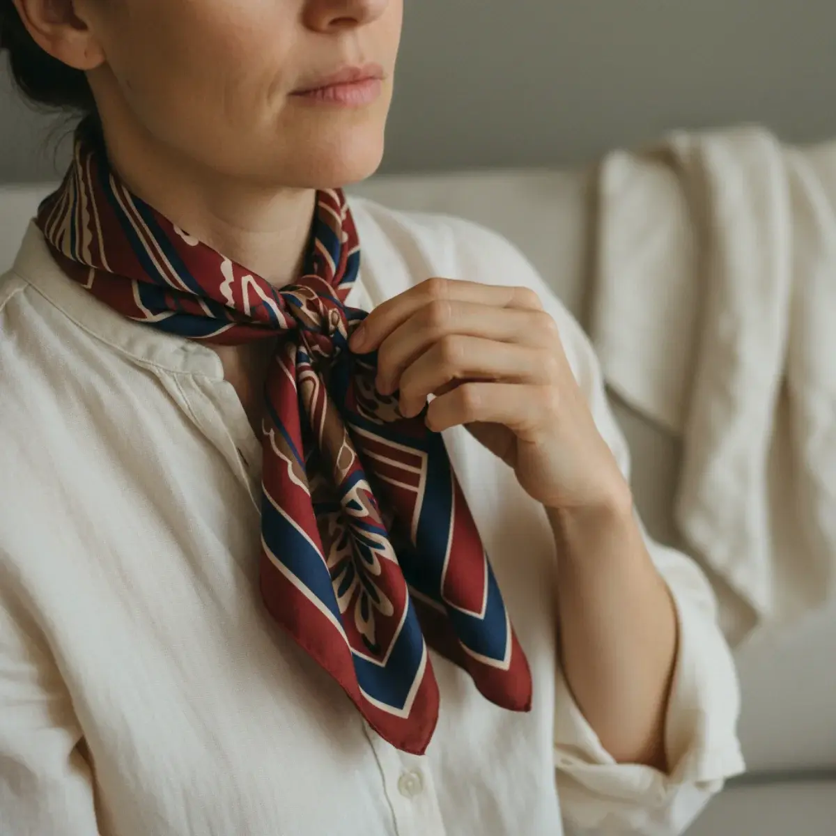Two scarf families: a lightweight silk square for polish and a substantial wool wrap for warmth